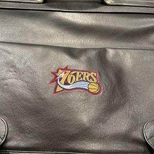 Genuine leather folding garment bag with Philadelphia 76ers logo
